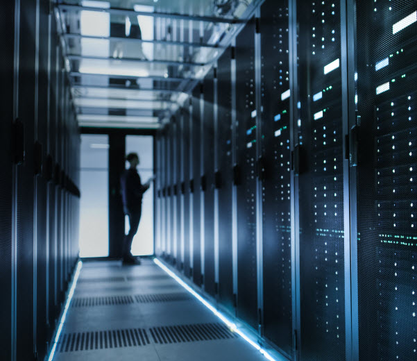 Alliance SI data centre migration network infrastructure Man inside a dark server room